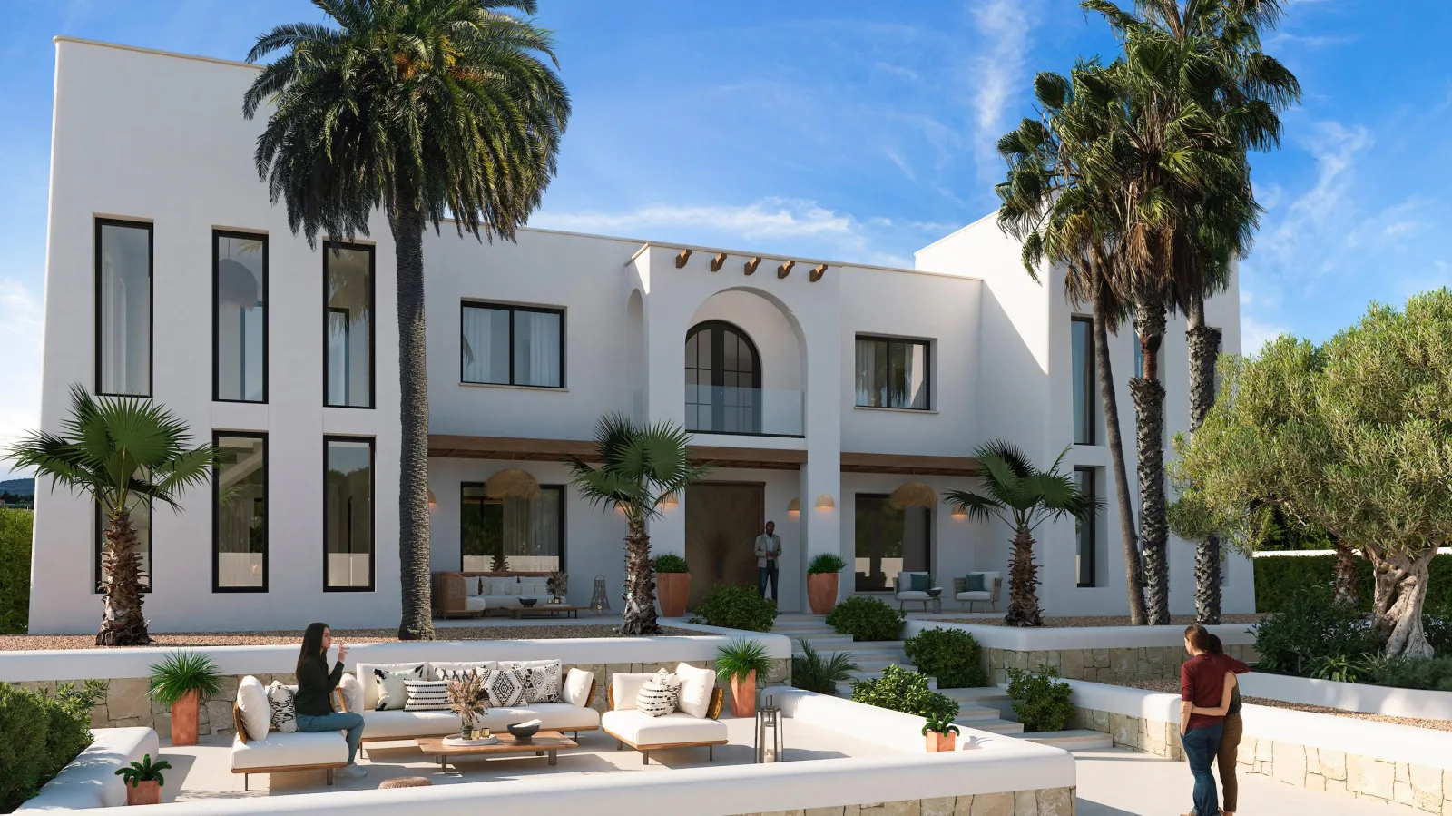 Fachada de entrada: casa blanca con ventanal en arco, portón de madera, palmeras y un olivo